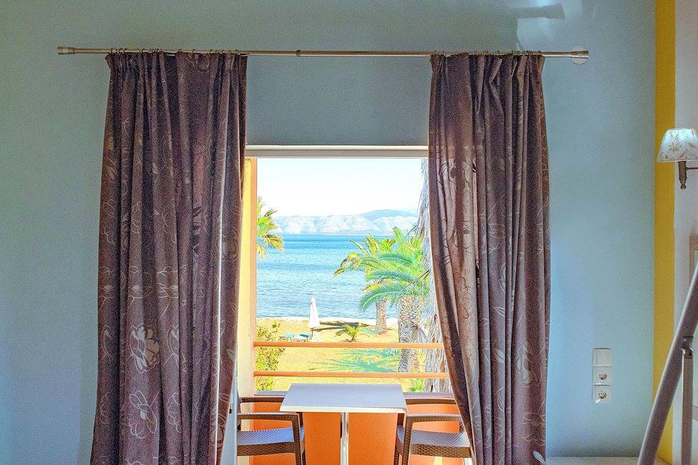 Entire apartment, Apartment with excellent sea view beside the beach in Kavos, Corfu