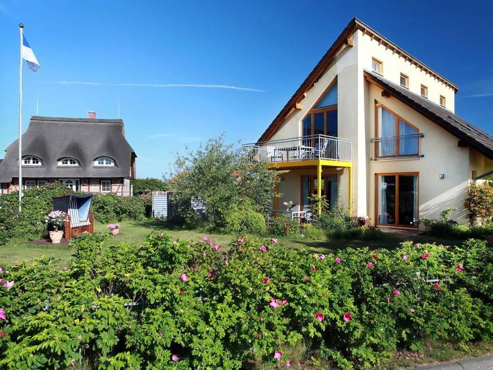Ferienhaus mit Meerblick für 4 Personen, mit Balkon und Garten, kinderfreundlich in Börgerende-Rethwisch