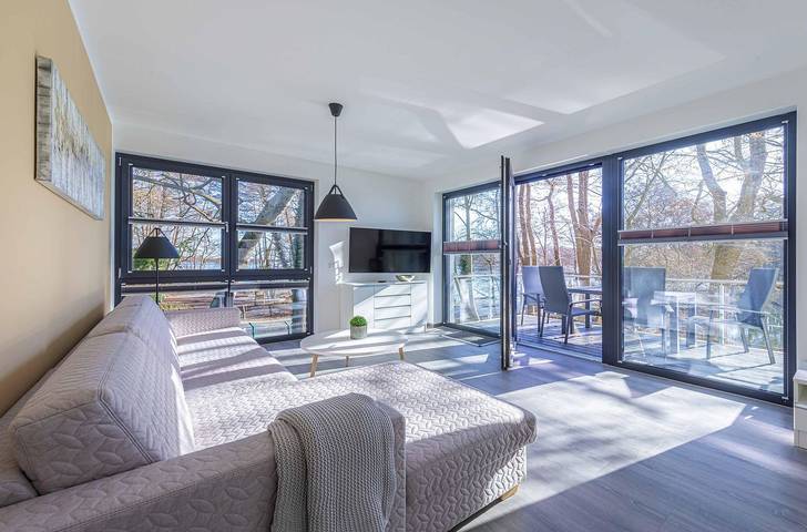 Ferienwohnung für 4 Personen, mit Balkon und Garten sowie Sauna und Seeblick in Krakow am See