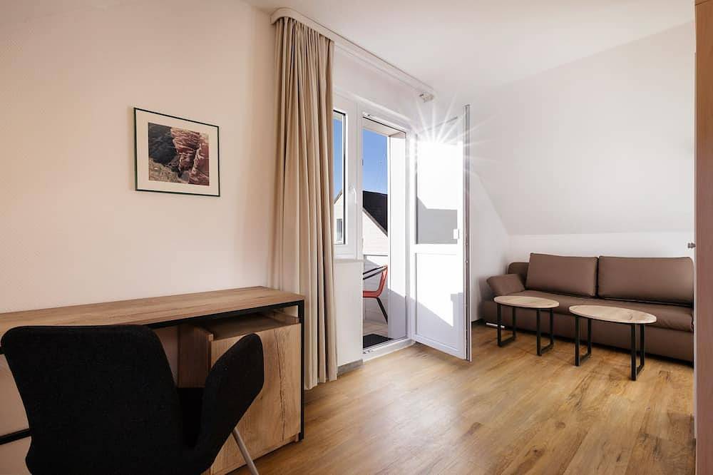 Hel lejlighed, Apartment roof to the island side with balcony - Hummerklippen Apartments in Helgoland