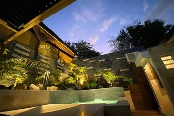 Location de vacances pour 4 personnes, avec piscine ainsi que jardin et vue à L'Étang-Salé