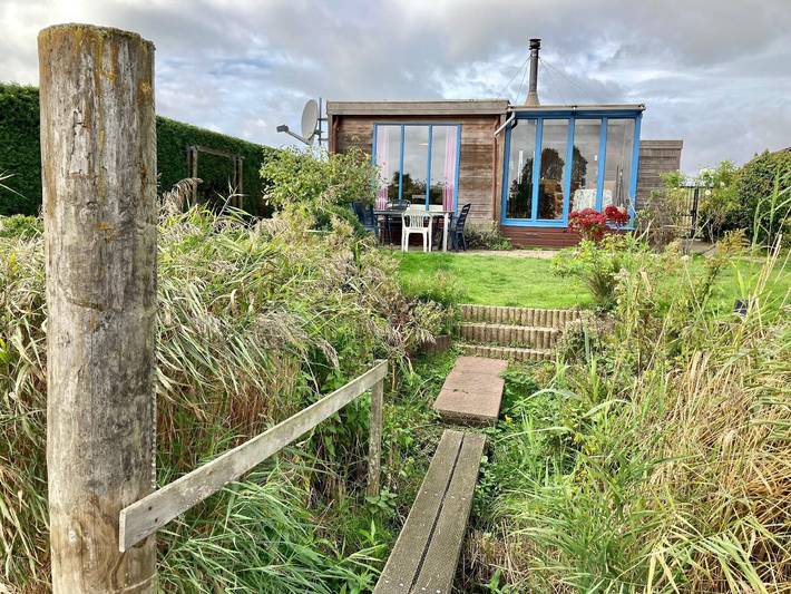 Chalet Casa Rosa mit kleinem Garten in Oostmahorn, Dongeradeel