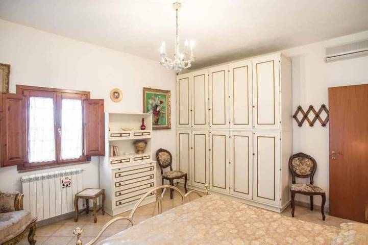Detached cottage in a landscaped garden with a view of the pool in Fauglia, Riviera Toscana