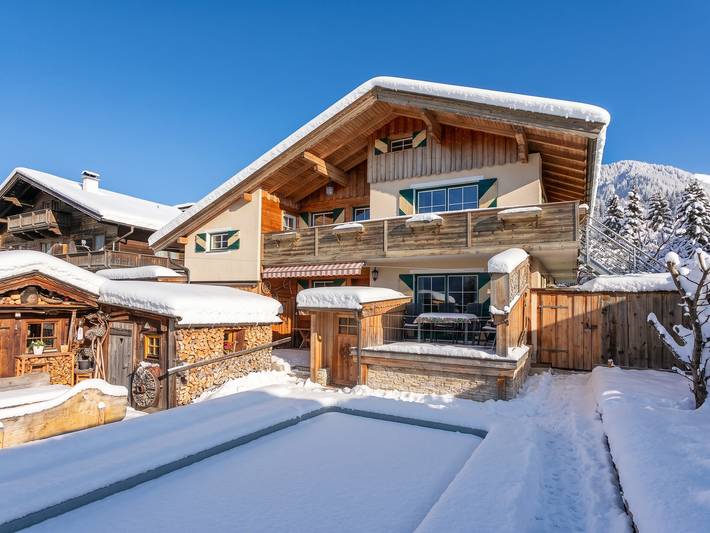 Ferienwohnung für 8 Personen, mit Balkon und Terrasse sowie Garten und Pool in den Kitzbüheler Alpen