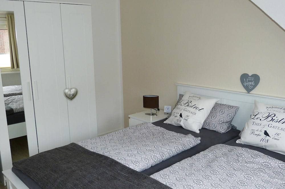 Ganze Wohnung, Sonnendurchflutete Ferienwohnung mit Mini-Meerblick im schönen Ostdorf in Juist