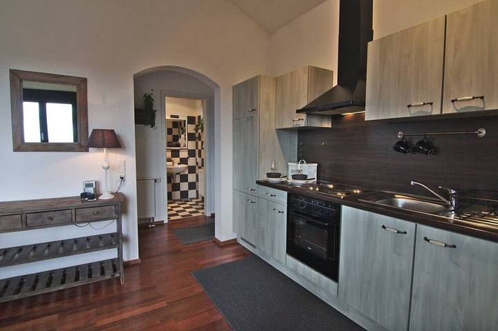 Appartement de vacances pour 2 personnes, avec balcon ainsi que piscine et jardin