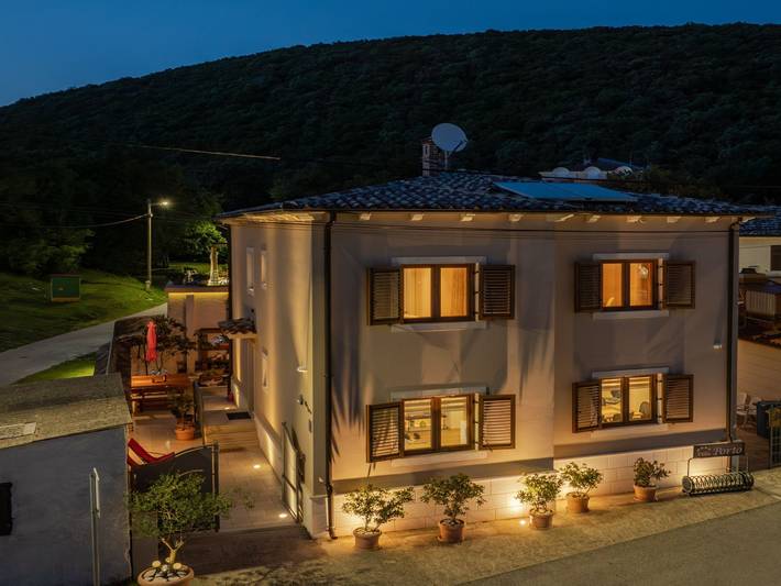Ferienhaus für 7 Personen, mit Terrasse und Garten