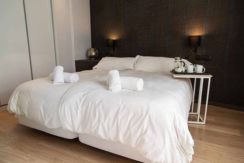 Apartamento entero, Lujoso apartamento de 2 dormitorios y 2 baños con balcón in Centro Barcelona, Barcelona