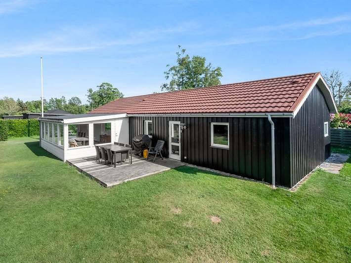 Ferieudlejning for 8 personer, med terrasse i Grenaa