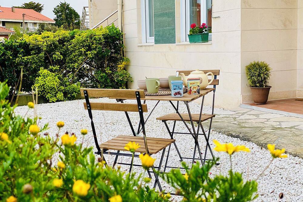 Apartamento entero, Casa Branca Cantabria: Amplio bajo con jardín a 500m de la playa | Wifi/Garaje in Miengo, Costa de Cantabria