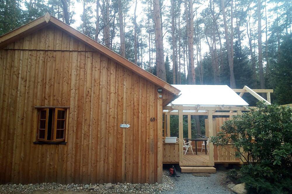 Das Ferienhaus\"Ortheide 69\" liegt in einer Waldsiedlung mit hohem Baumbestand. in Suderburg, Landkreis Uelzen