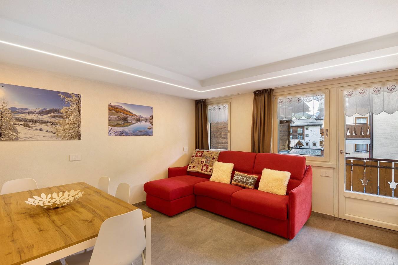 Appartement entier, Appartement 'A Due Passi Rosso' avec vue sur les montagnes, balcon et Wi-Fi in Livigno (Town), Livigno