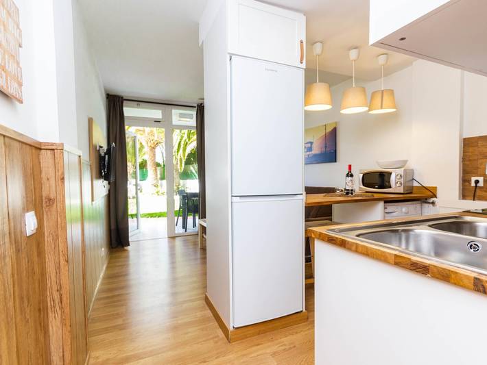 Appartement de vacances pour 2 personnes, avec Balcon ainsi que Jardin et Piscine