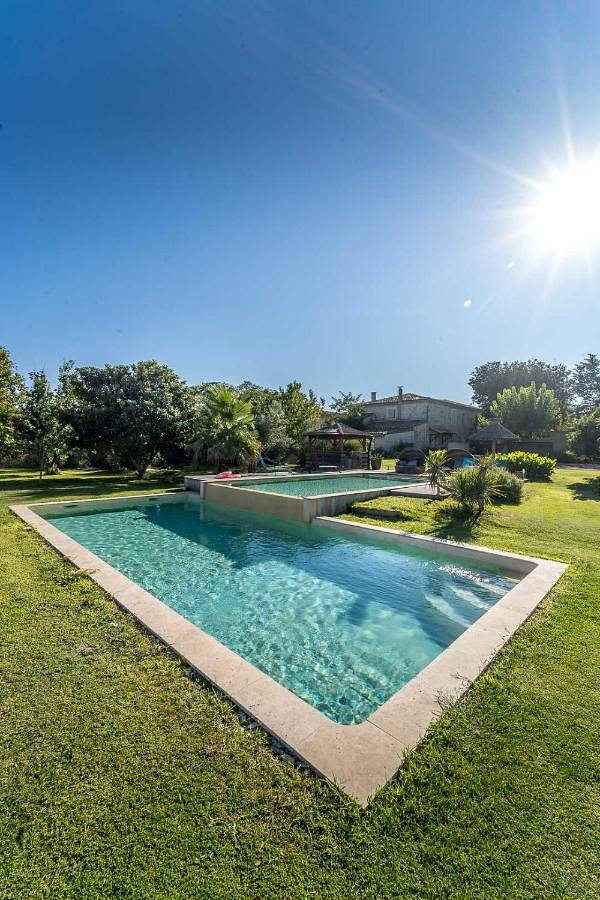 Appartement de vacances pour 7 personnes, avec Terrasse ainsi que Jardin et Piscine