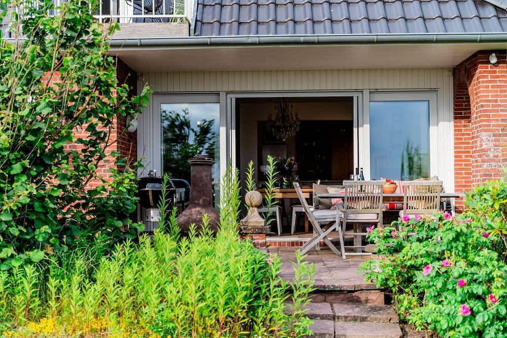 Unser Ferienhaus am Steg mit Meerblick, großem Garten und moderner Ausstattung in Schobüll, Nordfriesland