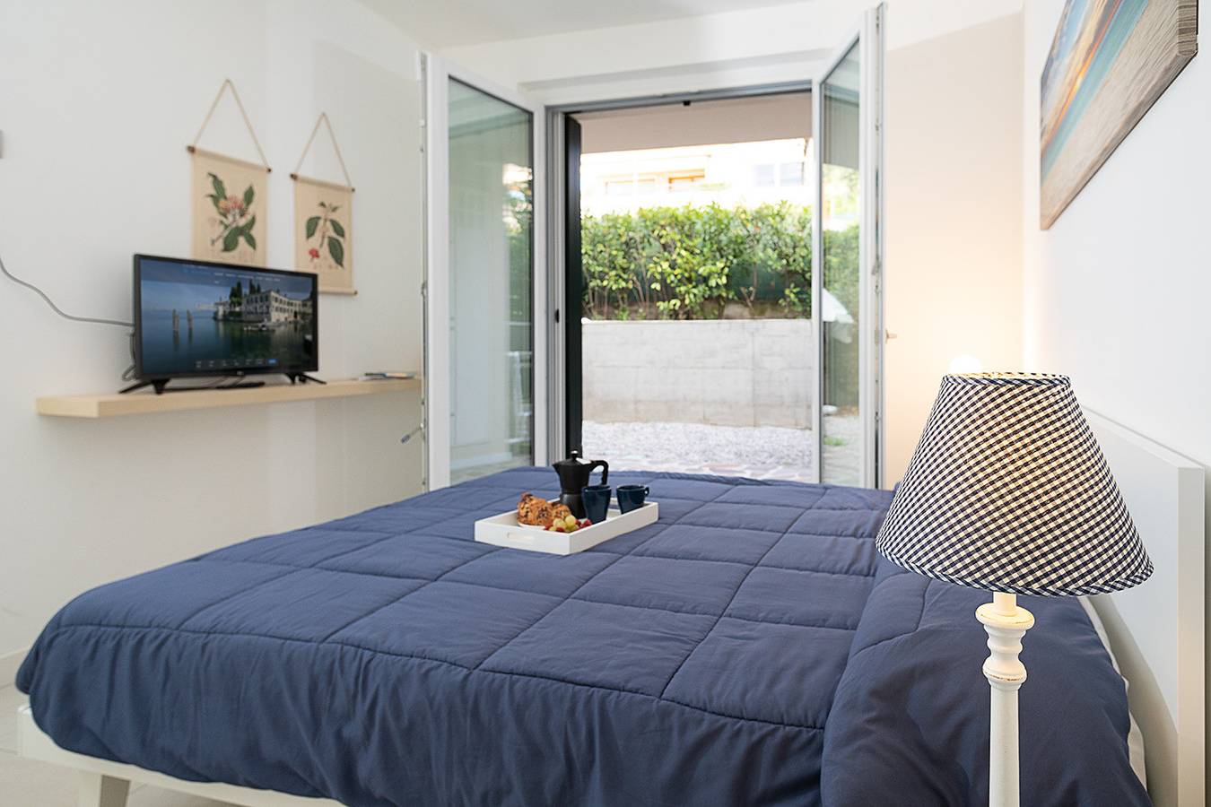 Apartamento entero, Regarda - Brezza di Lago 1 a Lazise con piscina, aria condizionata in Lazise, Montañas Garda