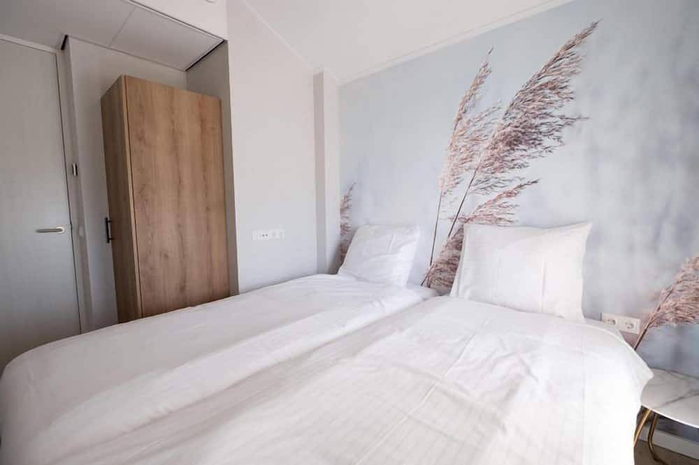 Geheel appartement, Ruim 6-persoons appartement met sauna, ligbad en uitzicht op het Ijsselmeer. Perfect voor families of vriendengroepen aan het water. in Workum, IJsselmeer