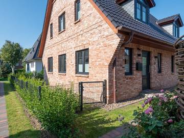 Ferienhaus für 4 Personen, mit Terrasse und Garten, kinderfreundlich in Tinnum