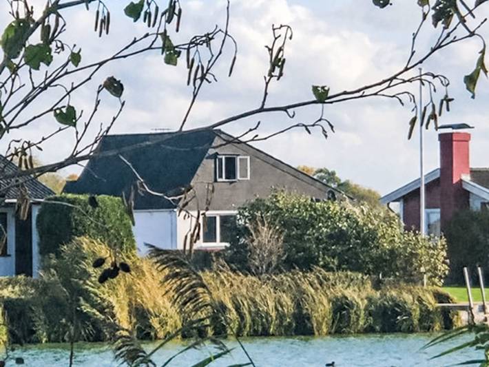 Ferienhaus für 4 Personen, mit Terrasse und Garten sowie Seeblick am Jadebusen