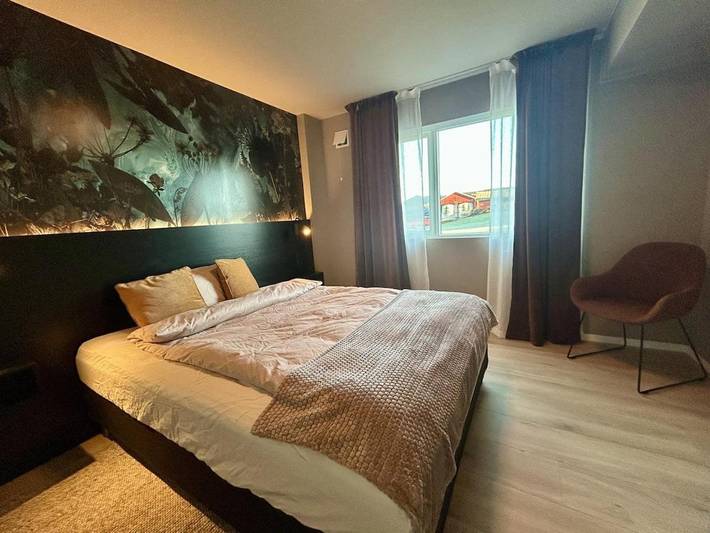 Ferienwohnung für 5 Personen, mit Garten und Ausblick in Os