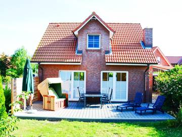 Ferienwohnung für 4 Personen, mit Sauna und Garten sowie Terrasse und Seeblick, kinderfreundlich in Brasilien (Ostsee)