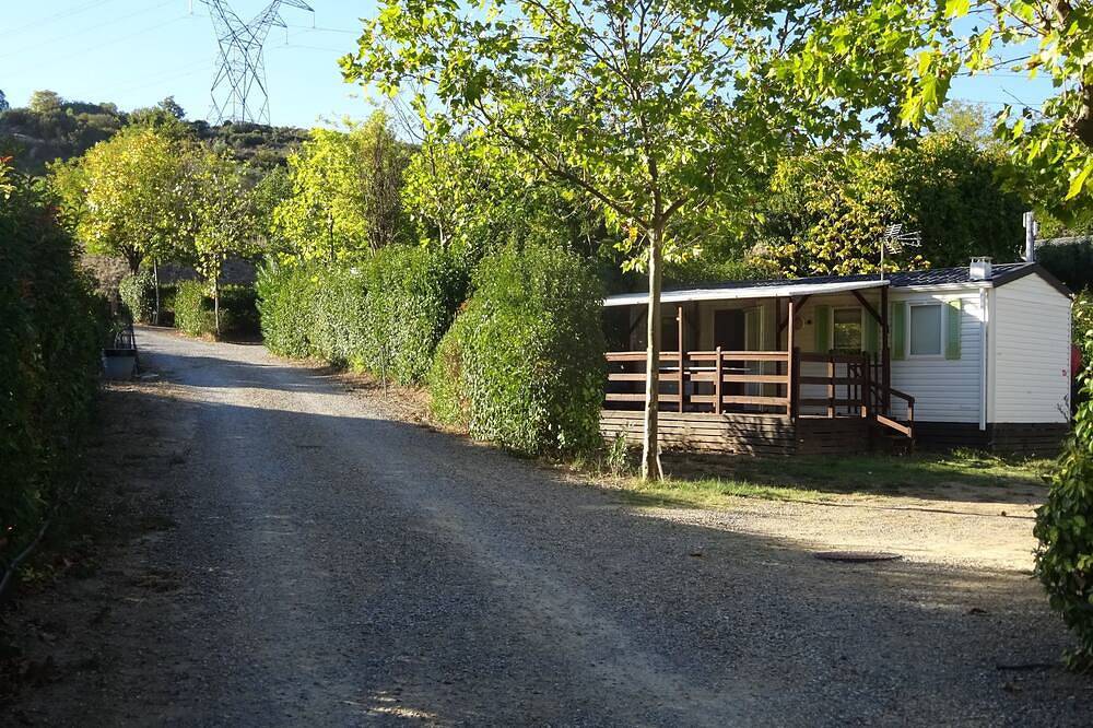 Mobil-home 4 personnes climatisé et tout équipé. in Fontès, Côte méditerranéenne (France)