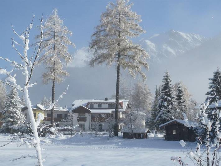 Ferienwohnung für 2 Personen, mit Whirlpool und Pool sowie Balkon und Garten, kinderfreundlich in Seefeld in Tirol