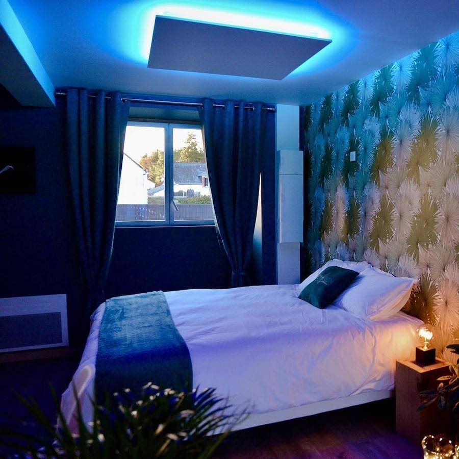 L'Evasion chambre Laos avec Jacuzzi privatif in Prinquiau, Vallée de la Loire