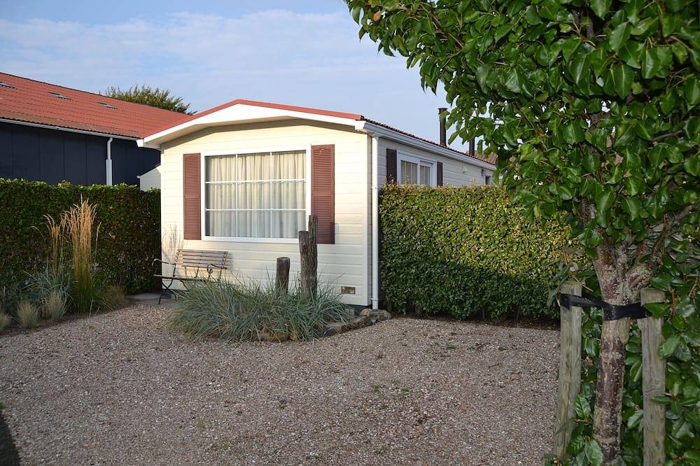Comfort chalet direct aan het strand in het zonnige Zeeland in Groot Valkenisse, Biggekerke