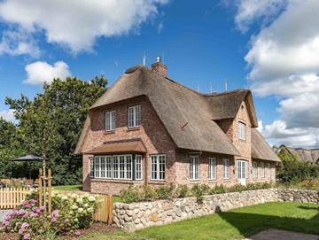 Ferienhaus für 8 Personen, mit Terrasse und Garten sowie Sauna in Oldsum