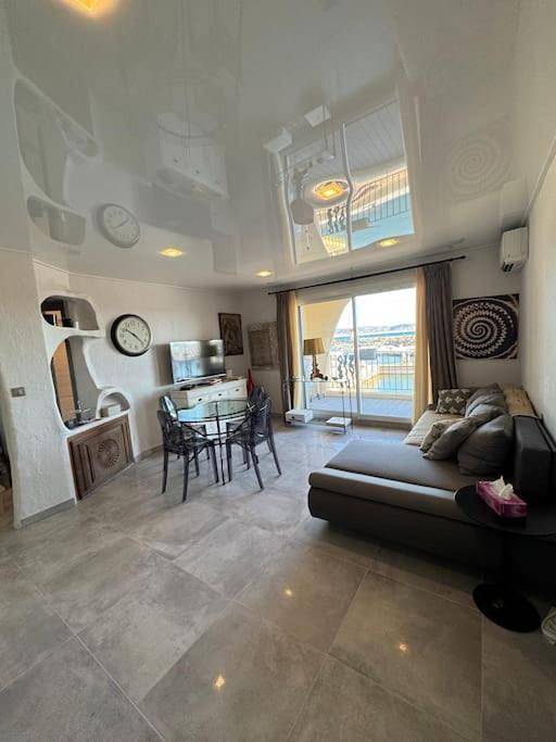 Appartement de vacances pour 4 personnes, avec jardin et piscine ainsi que vue et sauna