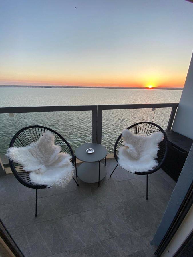 Appartement de vacances pour 4 personnes, avec vue ainsi que jardin et vue sur le lac