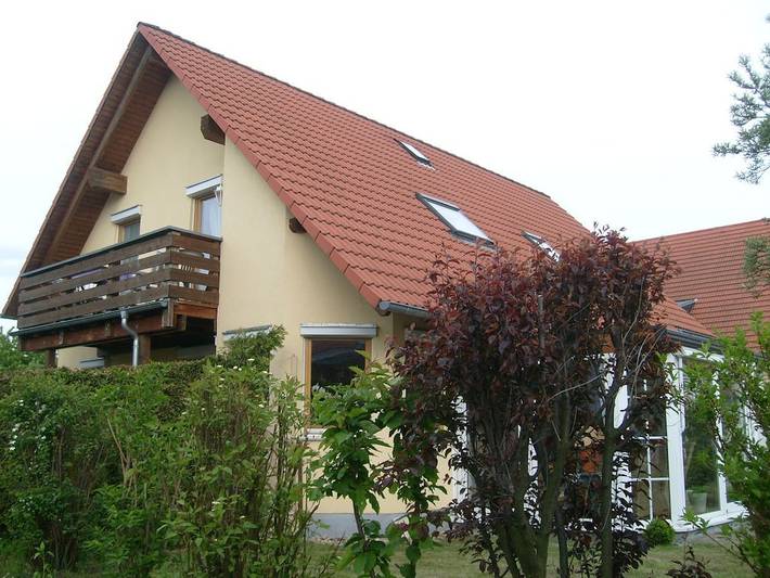 Ferienhaus für 4 Personen, mit Balkon und Garten
