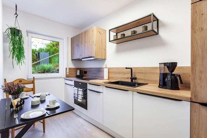 Appartement entier, Appartement 'Ferienhaus Doris' avec vue sur les montagnes, terrasse privée et Wi-Fi in Usseln, Willingen