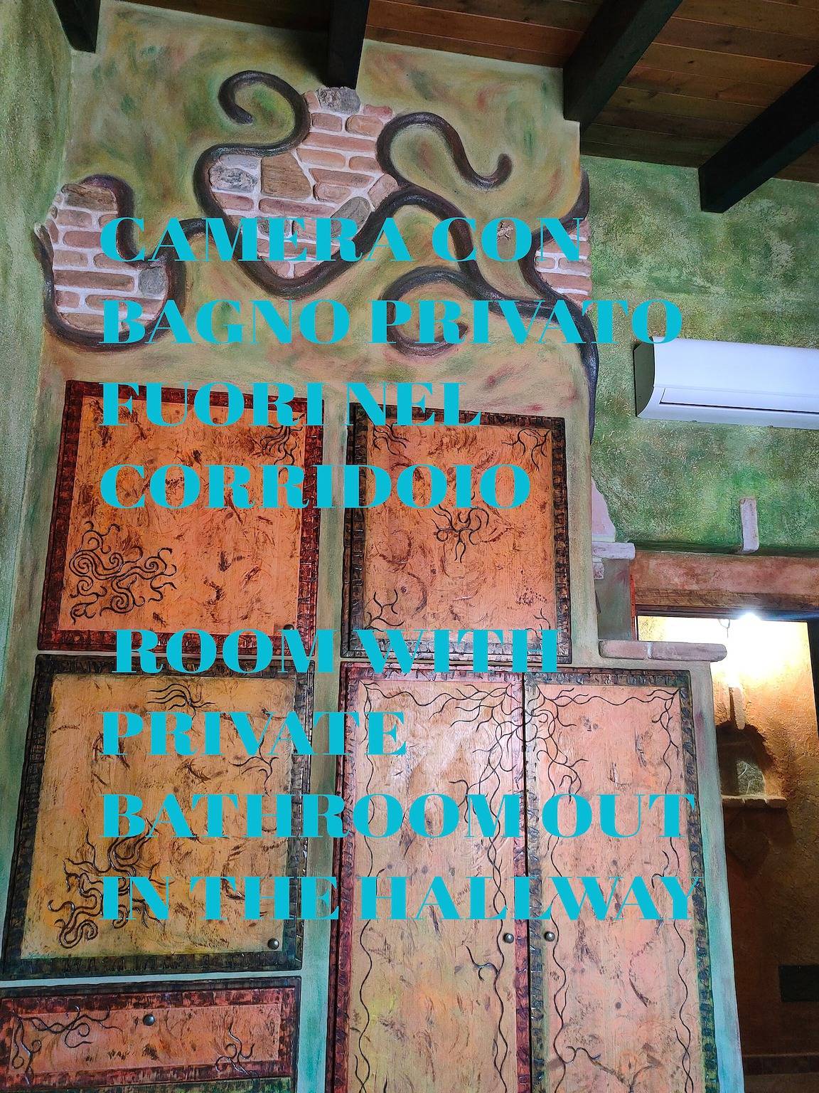 Room 'Guell' with Private Bathroom in the Hallway in Teulada, Cagliari Province