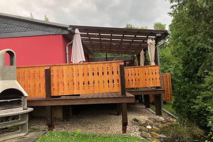 Ferienhaus für 4 Personen, mit Balkon/Terrasse und Terrasse sowie Garten