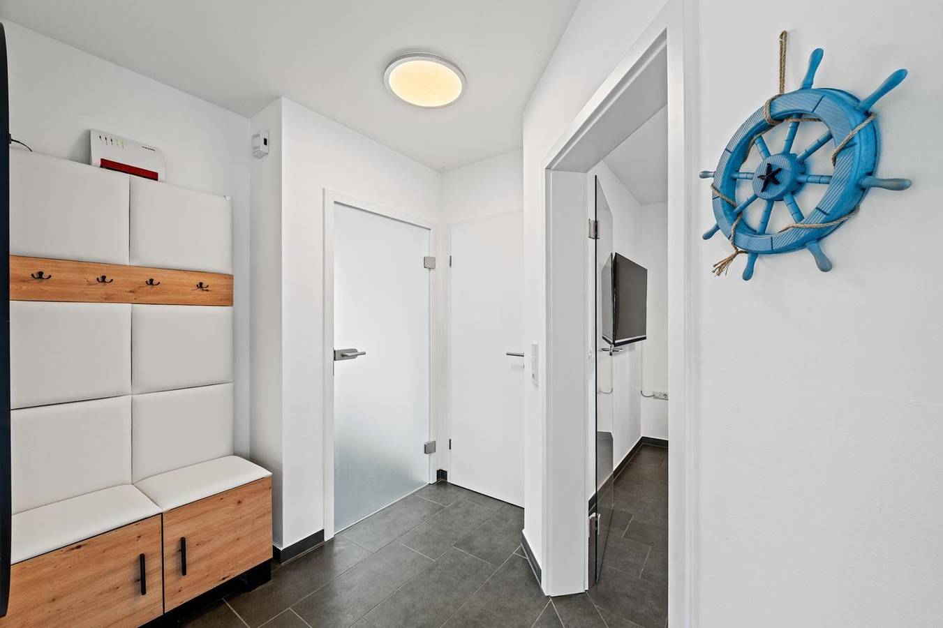 Ferienhaus "Waterlounge" am Wasser mit Sauna in Großefehn, Landkreis Aurich