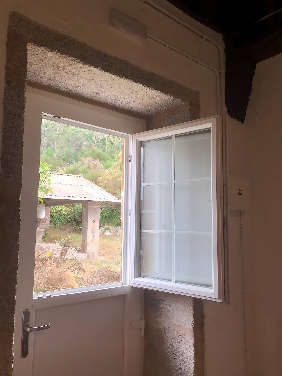 Appartement entier, Chambre 'Habitación Adaptada' avec vue montagne, terrasse partagée et Wi-Fi in Muxía, Costa da Morte