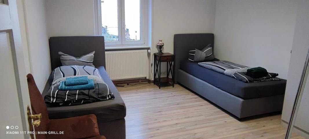 Ferienwohnung für 6 Personen, mit Balkon und Terrasse sowie Garten und Ausblick in Veitshöchheim