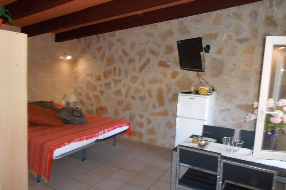 Finca Rustica con aire acondicionado y piscina comunitaria en una zona tranquila. in Xaló, Costa Blanca