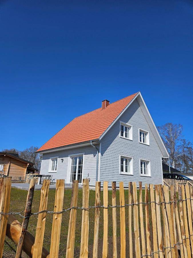 Ferienhaus für 6 Personen, mit Terrasse und Garten sowie Sauna und Seeblick in Flecken Zechlin