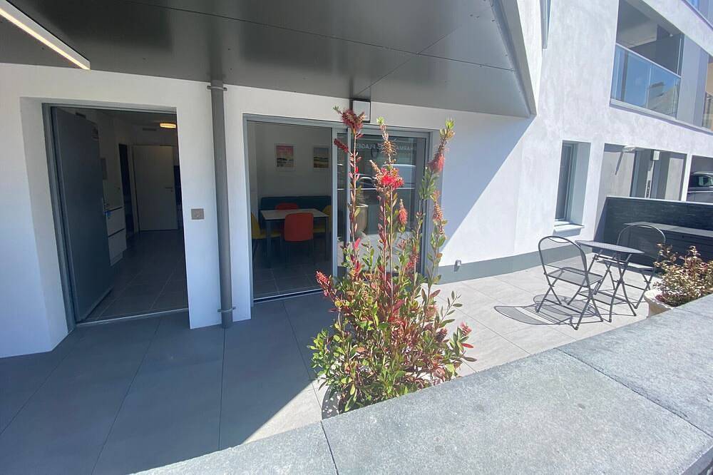 Appartement entier, Larmor-Plage : T2 en résidence de standing avec terrasse et parking, à deux pas de la plage et des commerces in Larmor-Plage, Côte des Mégalithes