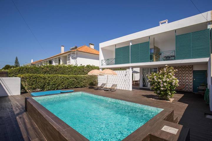 Casa de férias para 3 pessoas, com piscina e jardim e ainda vista, com animais de estimação na Costa de Caparica