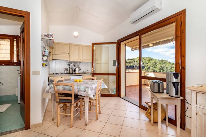 Appartamento intero, Appartamento "Casa Pineta" con splendida vista sul mare, giardino privato e aria condizionata in Rena Majore, Aglientu