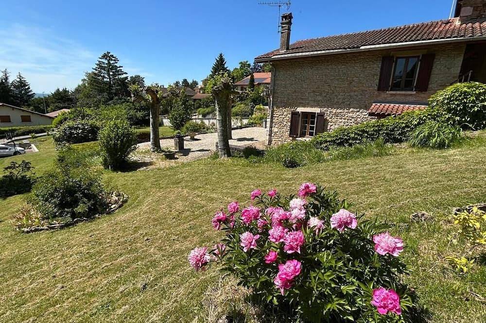 Stone house on the heights of Ambérieu. View of the Bugey mountains in Ambérieu-en-Bugey, Belley