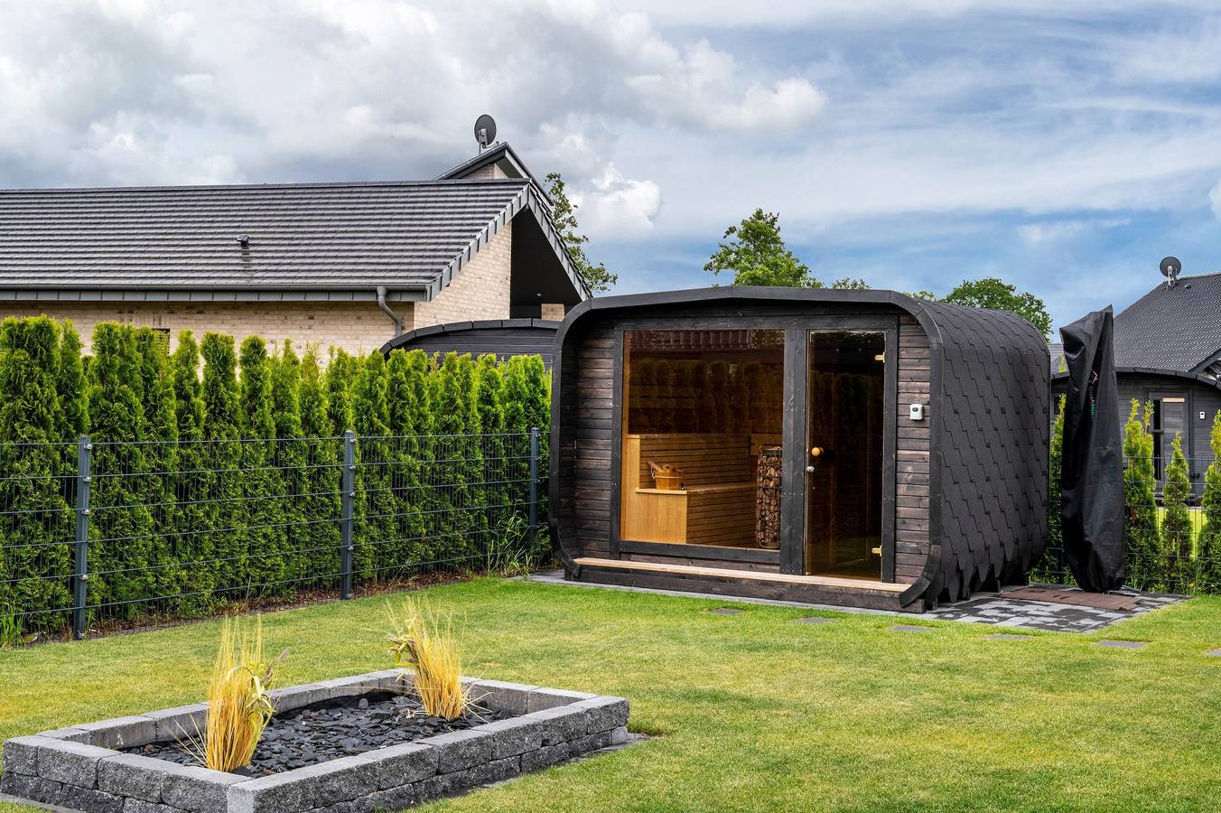 Ferienhaus 'Ferienhaus Am See Mit Sauna' mit privater Terrasse, privatem Garten und Wi-Fi in Barßel, Nordseeküste