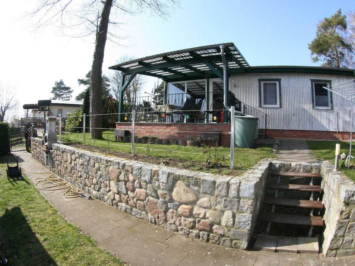 Ferienwohnung für 4 Personen, mit Garten und Ausblick sowie Terrasse und Seeblick, kinderfreundlich in Plau am See