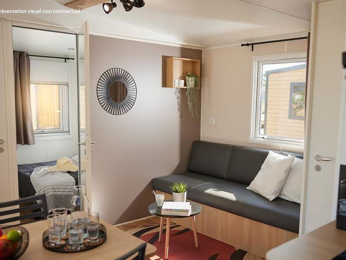 Flower Camping La Chênaie - Mobilhome 4 personnes - Homeflower Premium 29m² (2 chambres) + Clim + terrasse semi-couverte + Tv + draps + serviettes in Yport, Région du Havre