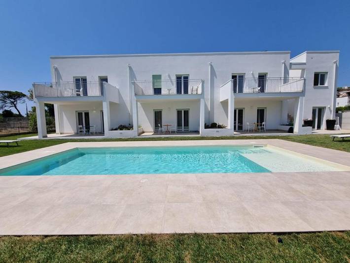 Appartamento per 4 persone, con Balcone e Terrazza nonché Giardino e Piscina per bambini a Paestum