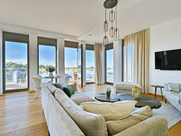 Ferienwohnung für 5 Personen, mit Seeblick und Sauna sowie Terrasse in Ummanz